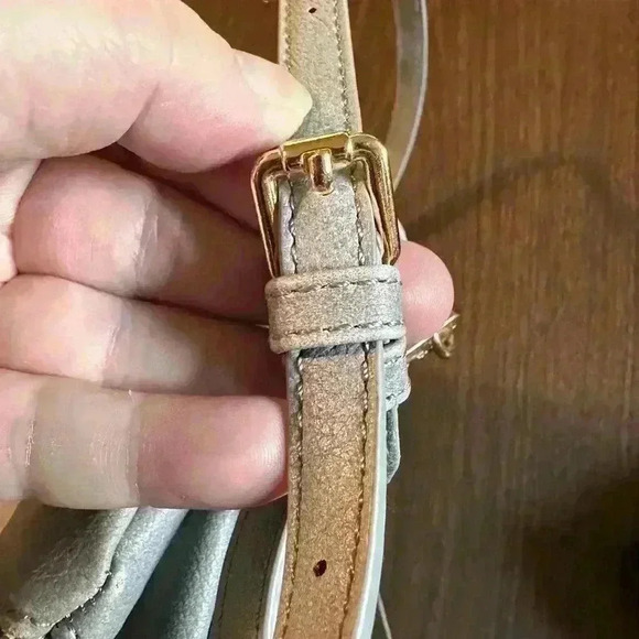 Grey Fold over Purse. Wristlet Strap. Shoulder Strap. Pockets. Zipper. Snap. - Picture 5 of 7